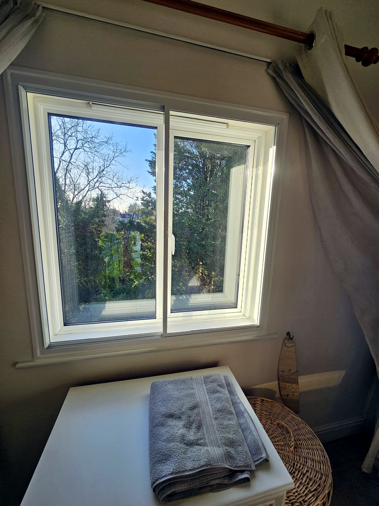 Secondary glazing on a bright corner casement window