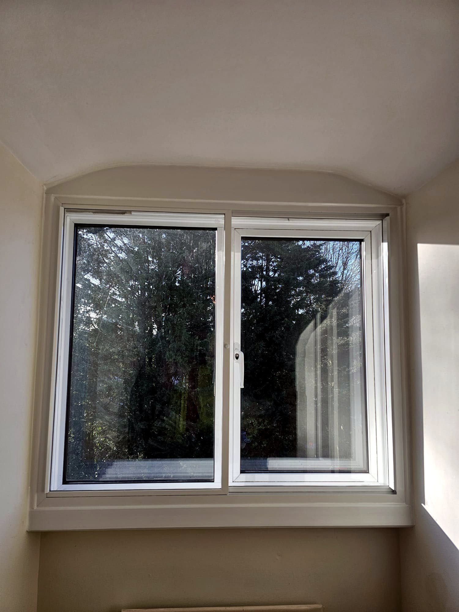 Dark-framed secondary glazing casement unit