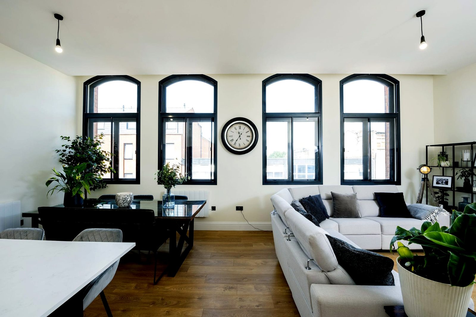 Arched secondary glazing in an open-plan living space