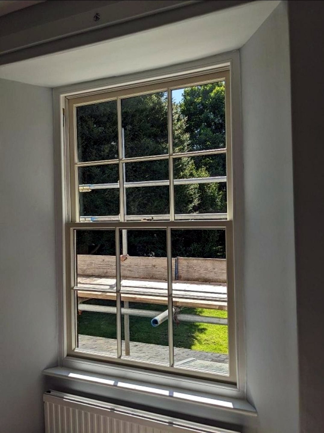 Georgian-bar secondary glazing to a timber sash window in a period country home