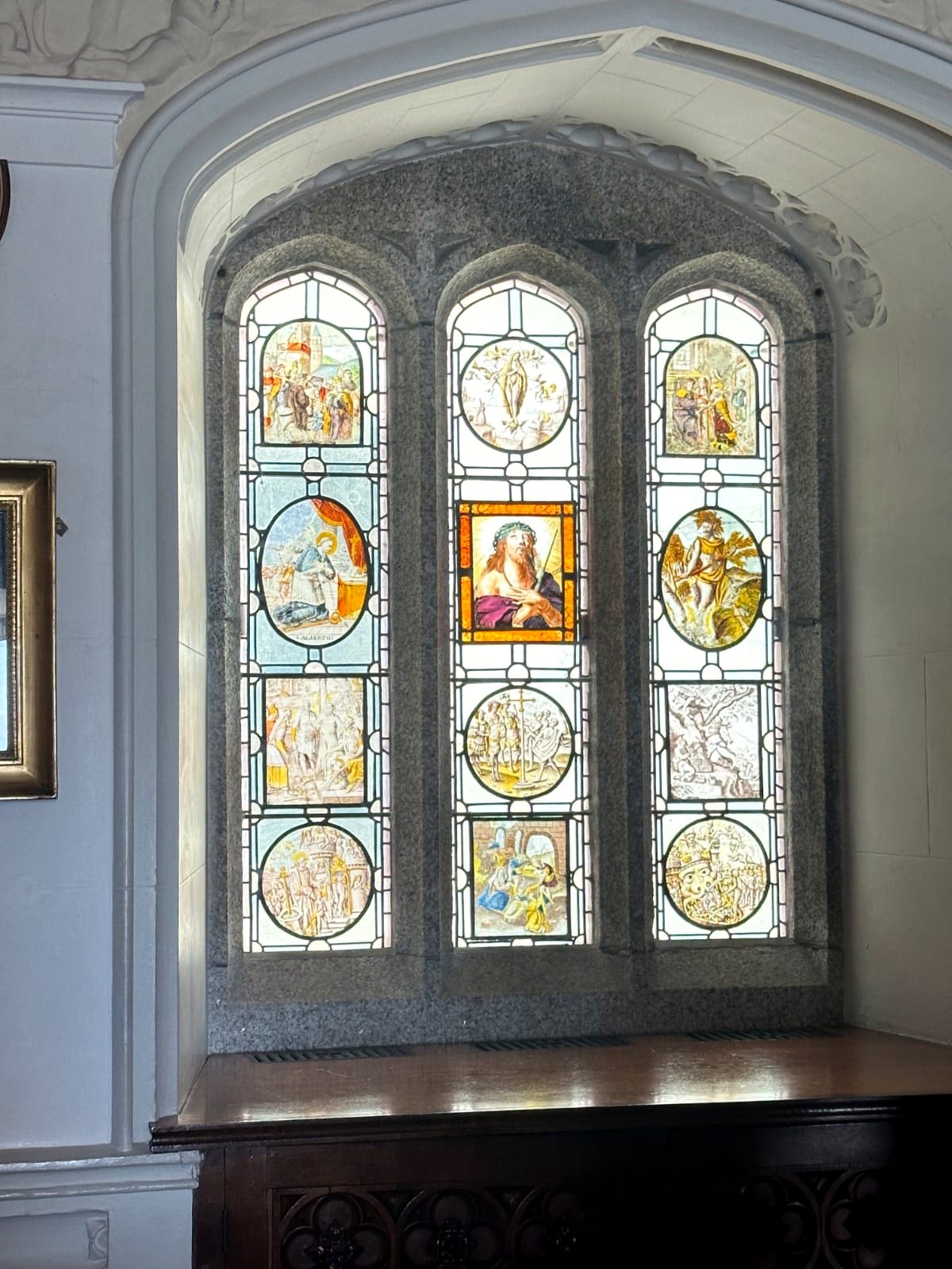 Secondary glazing protecting an original stained-glass window
